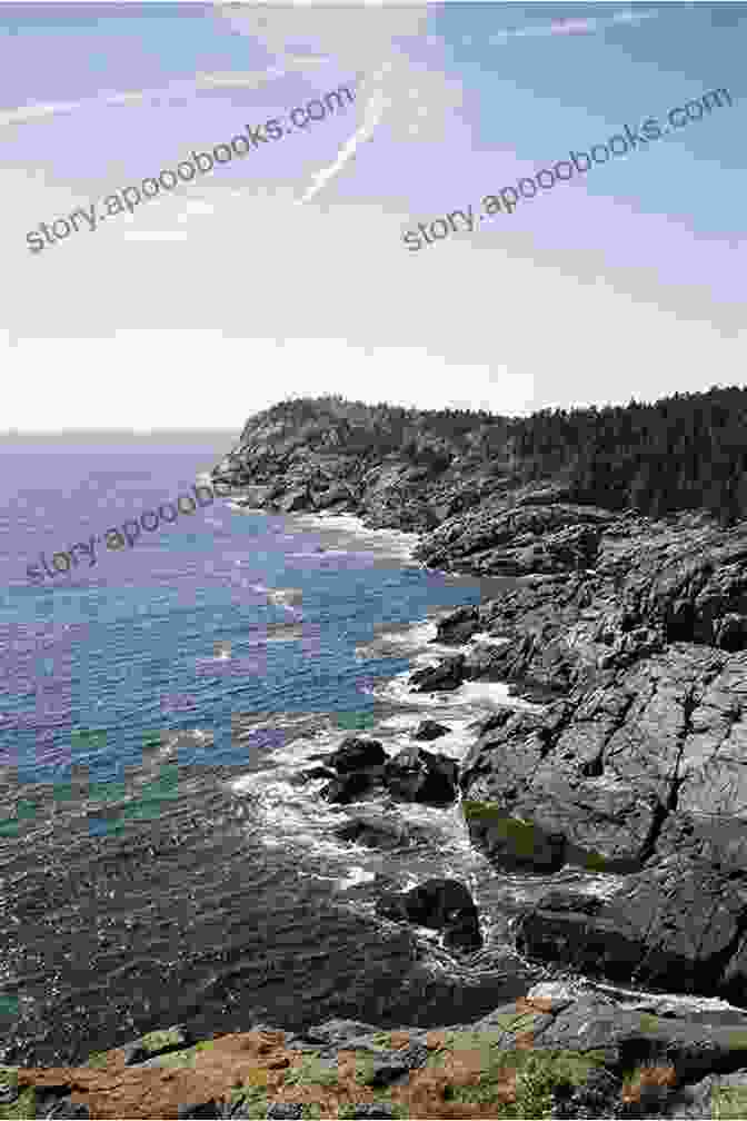 A Breathtaking View Of The Monhegan Islands, With Towering Cliffs, Emerald Green Waters, And Lush Vegetation. Monhegan: A Guide To Maine S Fabled Islands