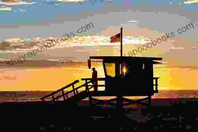 A Group Of People Enjoying A Day At The Beach, With A Lifeguard Tower In The Background. Stay Safe This Summer: Health And Safety For Young Workers