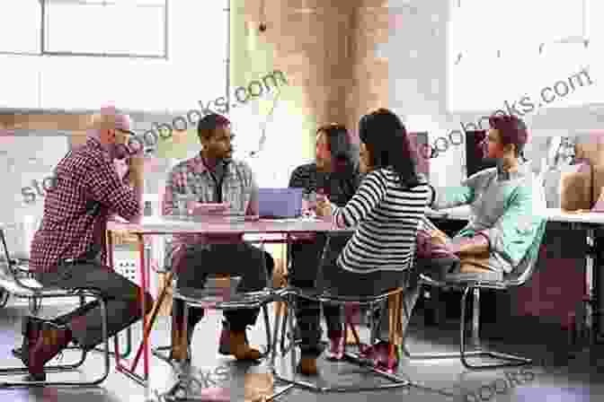 A Group Of People Sitting Around A Table, Discussing Ideas Hu$tleaire Magazine (Best Of 2024)