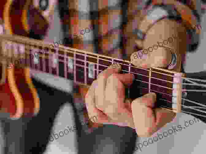 A Guitarist Playing A Variety Of Chords Chord Studies For Electric Bass: Guitar Technique (Workshop (Berklee Press))