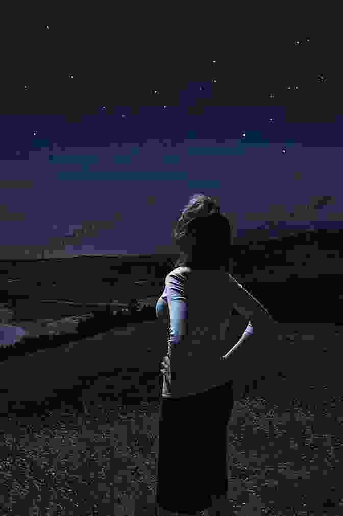 A Woman Standing In A Field, Looking Up At The Stars Hu$tleaire Magazine (Best Of 2024)