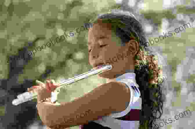 A Young Woman Playing The Flute Playing The Flute: Learn To Play The Flute From Beginning