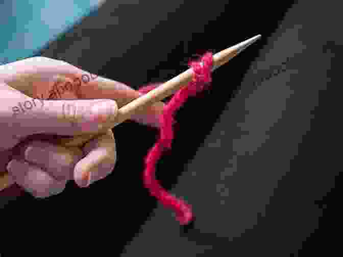 Hands Casting On Stitches Onto Knitting Needles Learn To Knit Your First Scarf